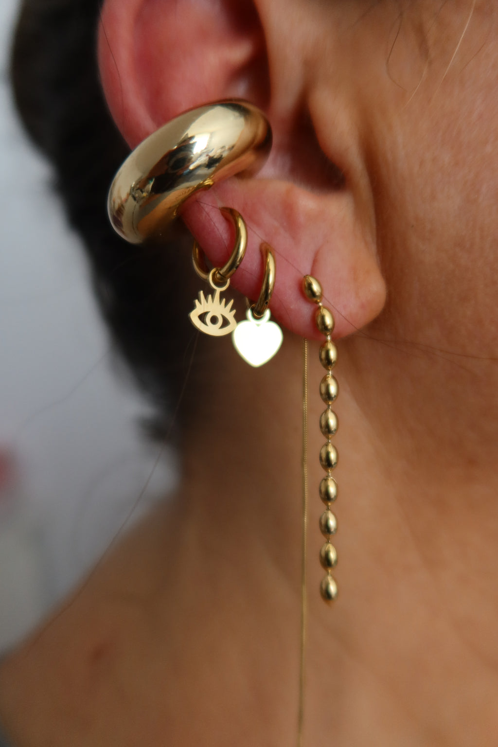 Pendiente Mini Ojo Dorado